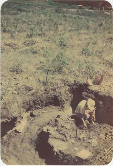 Area B, Trench 1, Cache 2 partly cleared showing burned oyster shell