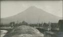 Buildings with view of mountain in background, possibly Antigua