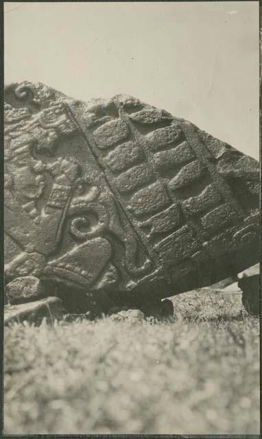 Close view of broken stone sculpture, possibly Arevalo