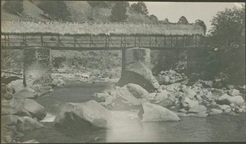 Bridge over rocky river