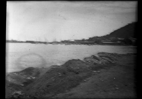 Buildings and boats along shoreline