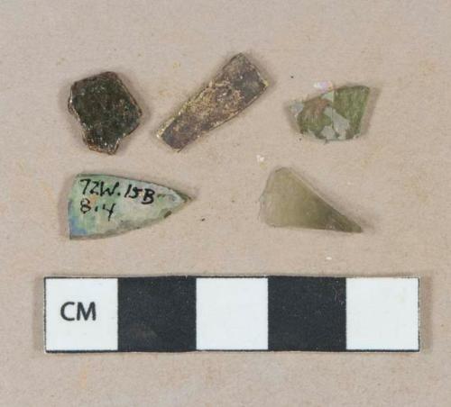 Olive green vessel glass fragments, likely body fragments