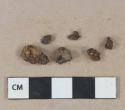 Unidentified ferrous metal fragments, heavily corroded, possible nail fragments