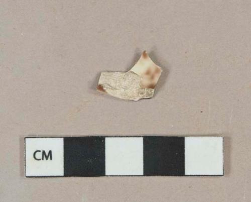 Brown on cream mottled lead glazed earthenware vessel body fragment, white paste, likely rockingham ware