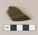 Dark olive green vessel glass fragment, likely bottle