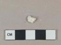 White plaster fragment