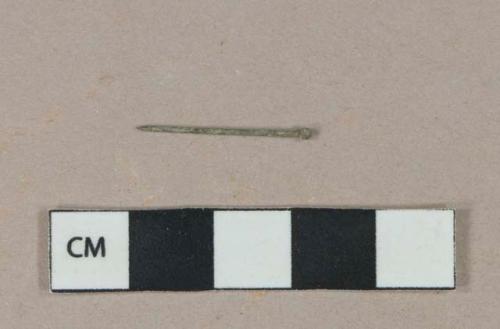 Straight pin, cupreous; intact, ball end, lightly corroded