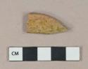Greenish yellow lead glazed redware vessel body fragment