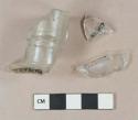 Colorless glass vessel fragments, 1 brandy bottle finish fragment