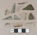 6 light aqua flat glass fragments; 1 olive green flat glass fragment; 4 colorless flat glass fragments; 1 olive glass vessel body fragment