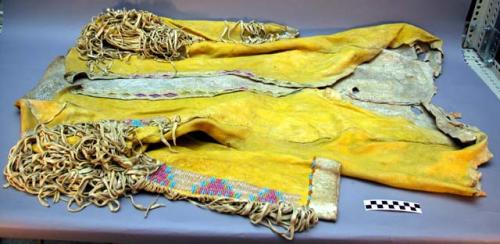 Jacket of yellow dyed buckskin, fringed. Multi-colored beadwork.