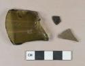 Olive green vessel glass body fragments, likely bottle