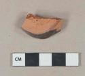 Brown lead glazed redware vessel body fragment