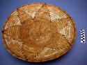 Medium size basket tray, coiled. Made of yucca plant (natural and dyed yellow)