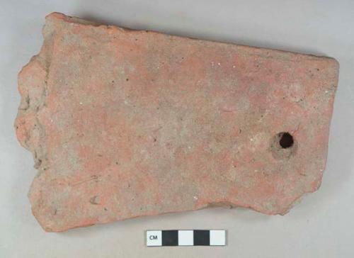 Earthenware, red clay roof tile; nail hole at one end