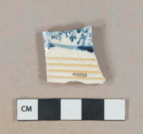 Blue on white mocha dendritic decorated yellowware body fragment, buff paste