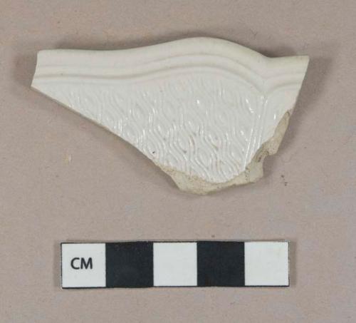 White salt-glazed stoneware vessel rim fragment, light gray paste, barley molded decoration