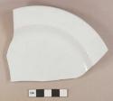 Earthenware, refined, pearlware; undecorated, plate fragment, white paste, back stamp "T. & R. BOOTE"