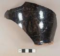 Black lead glazed redware vessel body and portion of base fragment, possible jar