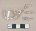 Light amethyst or weathered colorless vessel glass body fragments