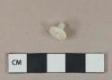 White opaque glass fragment, possible push-pin fragment