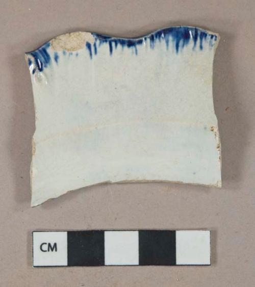 Blue on white shell-edged pearlware vessel rim fragment, scalloped rim, white paste