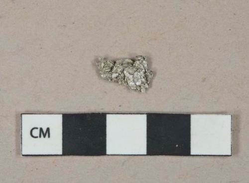 Foil wrapper fragment, possible gum wrapper