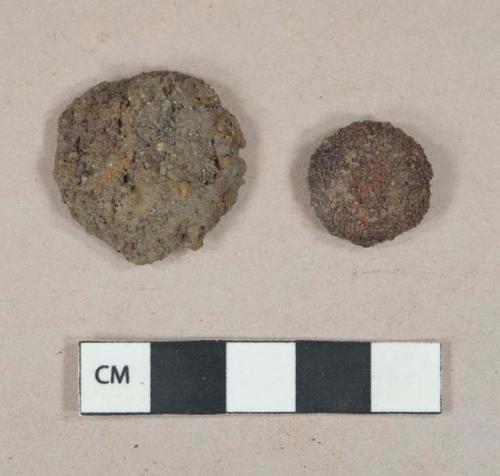 Ferrous metal buttons, heavily corroded