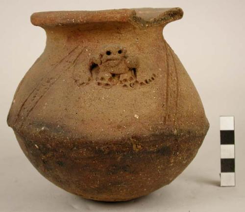 Pottery jar with incised and modelled designs