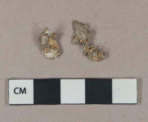 Gold-colored metal foil fragments, silver-colored interior