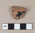 Black lead glazed redware vessel fragment