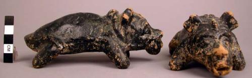 Terra cotta whistle.  Quadruped form, black