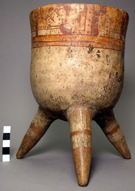 Complete ceramic jar, 3legs, polychrome, hieroglyphic band at rim.