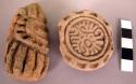 Terra cotta stamps, cylindrical and circular