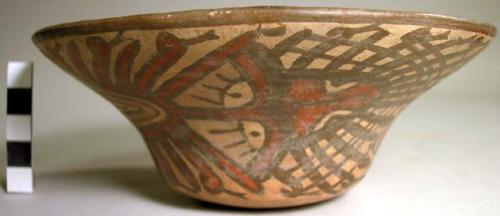 Bowl with black, red and white designs