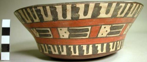 Bowl painted with geometric motifs (abstract trophy heads?)