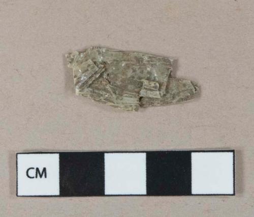 Gray plastic wrapper fragment