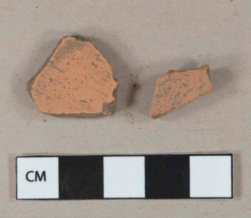 Unglazed undecorated redware vessel body fragments