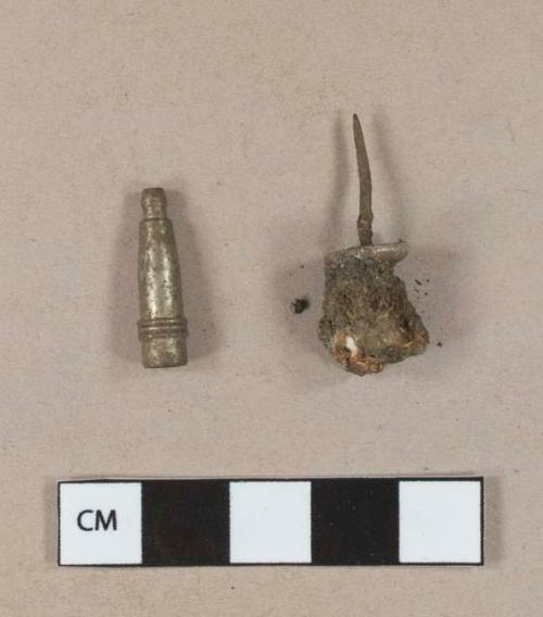 Metal alloy pus pin, heavily corroded; metal alloy mechanical pencil tip