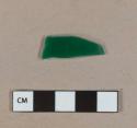 Green and white layered glass fragment, possibly banker lamp glass shade