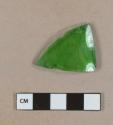 Bright green glass vessel body fragment