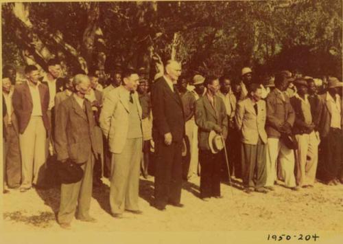 Fransfontein indaba, two headmen a group of men standing with Colonel Hoogenhout