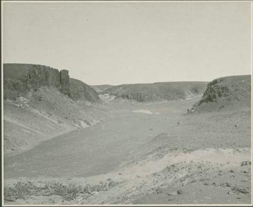 Landscape with cliffs and sand (print is a cropped image)