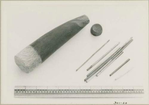 Quiver, most likely made from horn and animal skin, seven arrow shafts, and a ruler for measurement