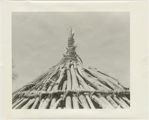 Roof peak of partly finished hut, close-up (print is a cropped image)