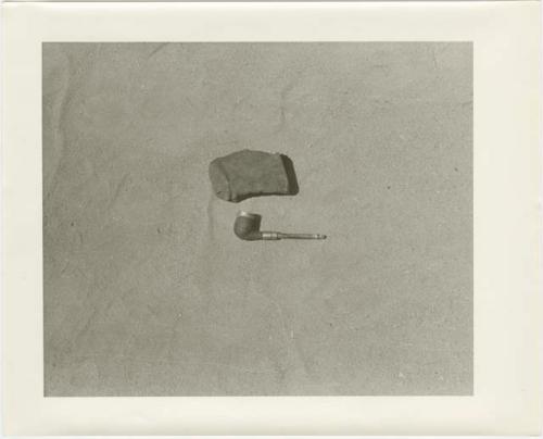 Pipe and leather tobacco pouch (print is a cropped image)