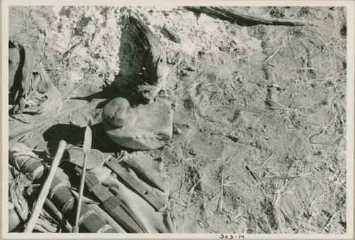 "Gao Medicine's" possessions including an anvil stone and another stone used to crack and grind objects