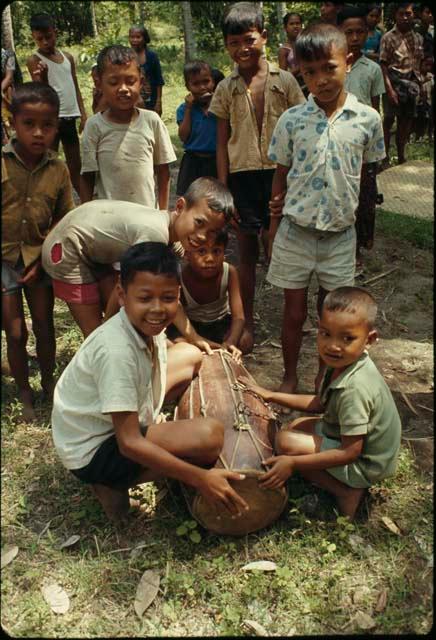 Children playing with drum and Djatilan performance