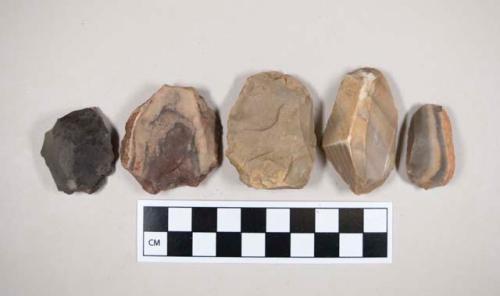 Chipped stone, scrapers or flakes, tan, gray, brown, red, or black in color, some cortex