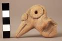 Moulded pottery figurine- bird head figure